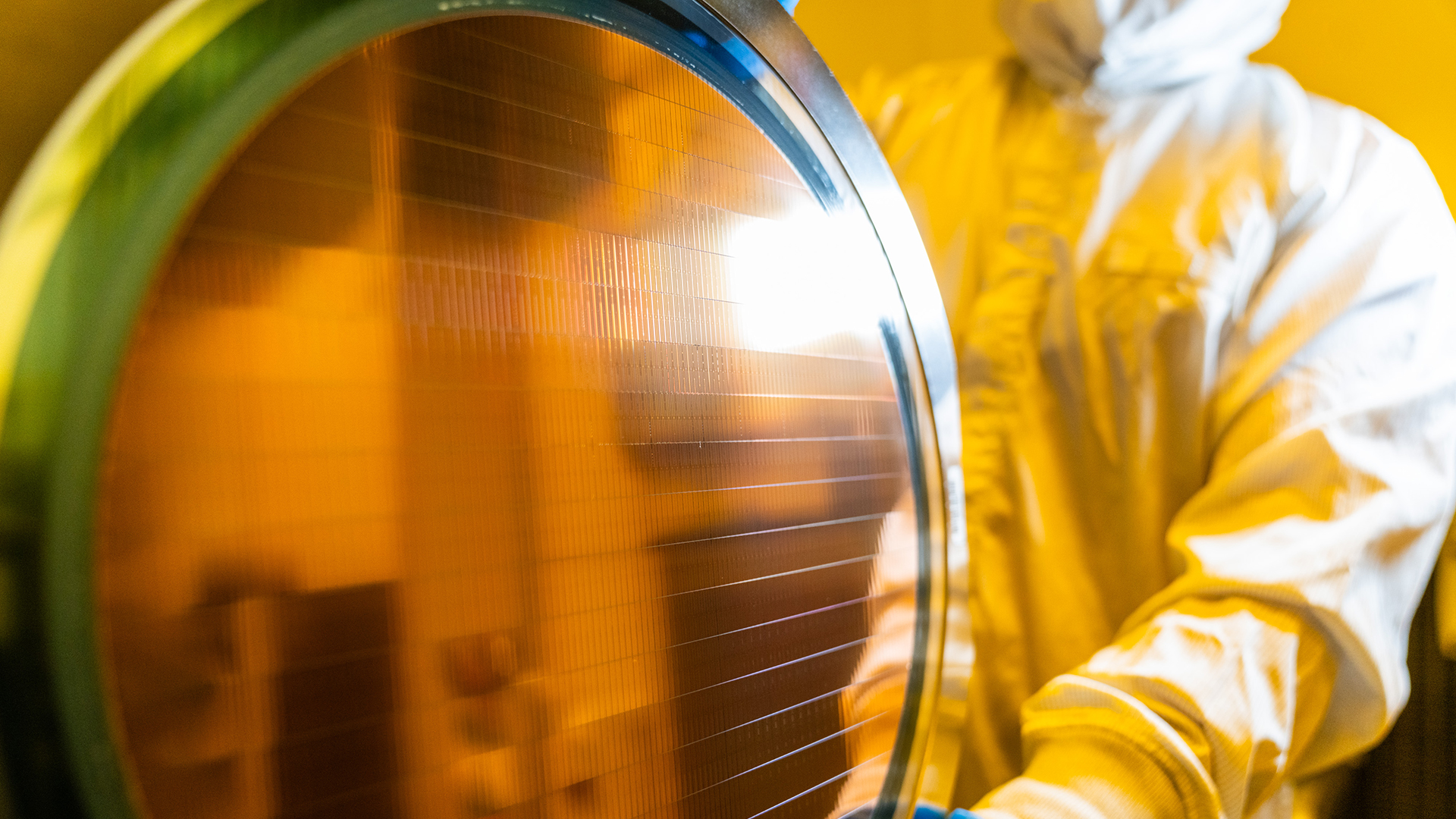 photo shows an Intel wafer featuring Intel EMIB advanced packaging technology at Intel Assembly and Test Technology Development factories in Chandler, AZ