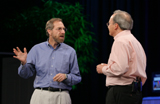 Alan Ganek CTO of Tivoli Software and VP of Autonomic Computing for IBM (left) talks to Justin Rattner, Intel Senior Fellow and Director of Intel's Corporate Technology Group, about the IBM's  robotics institute during Rattner's keynote held at the San Francisco, Moscone Center West on Thursday, August 25, 2005. (Intel Press Relations)