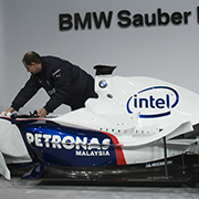 INTEL LOGO GETS SPEED BOOST: BMW Sauber F1 team rolls out the new car adorned with Intel’s new corporate logo at event in Valencia Spain. The official corporate sponsorship is part of a broader technology and co-marketing agreement between the renowned car maker and the technology innovator known for its computer chips.